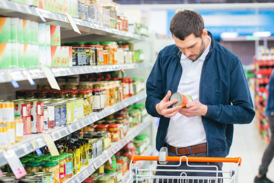 Man looking at food labels