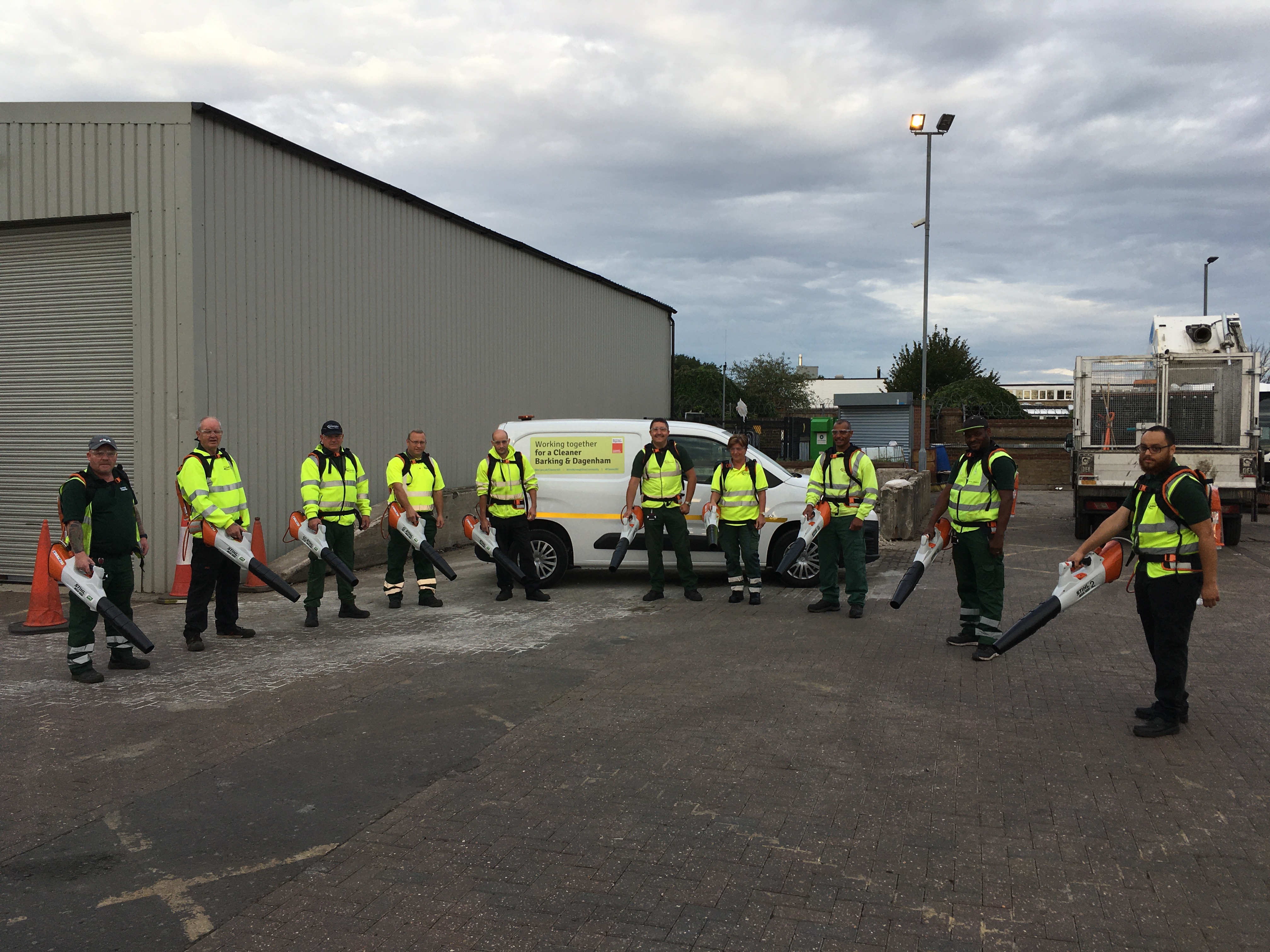 The environmentally-friendly new electric blowers in action