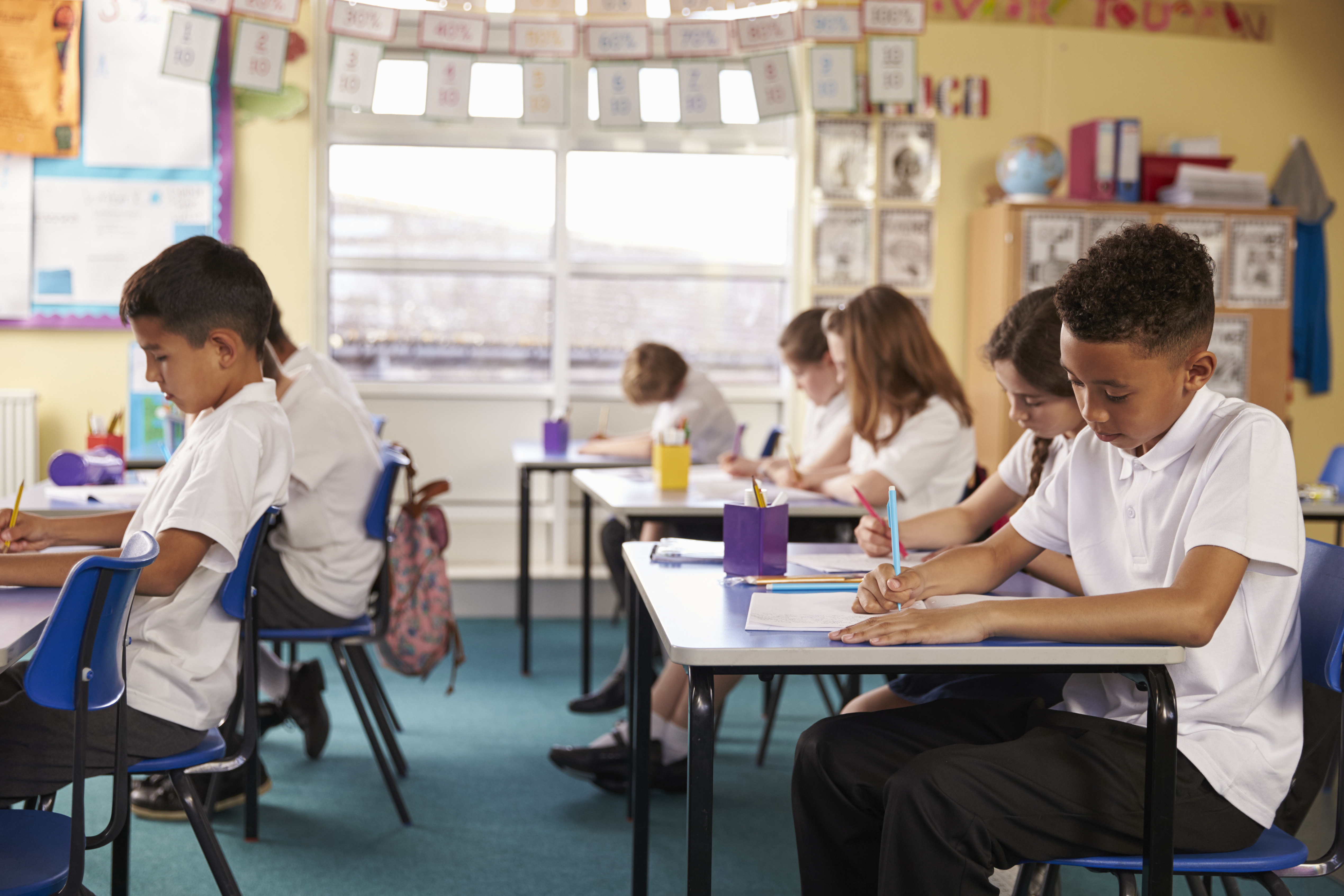 children studying in classroom