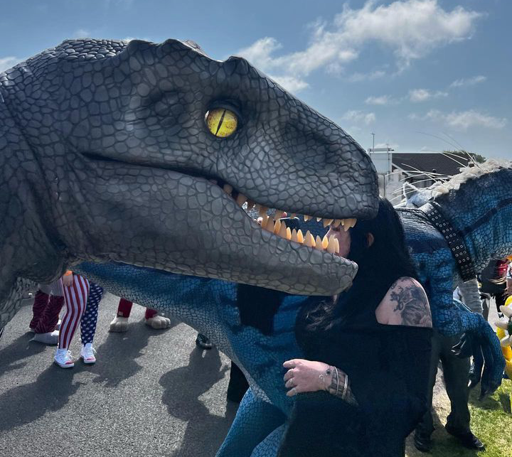 Photo of Meet the Dinos, with a close up of one of the dinosaurs