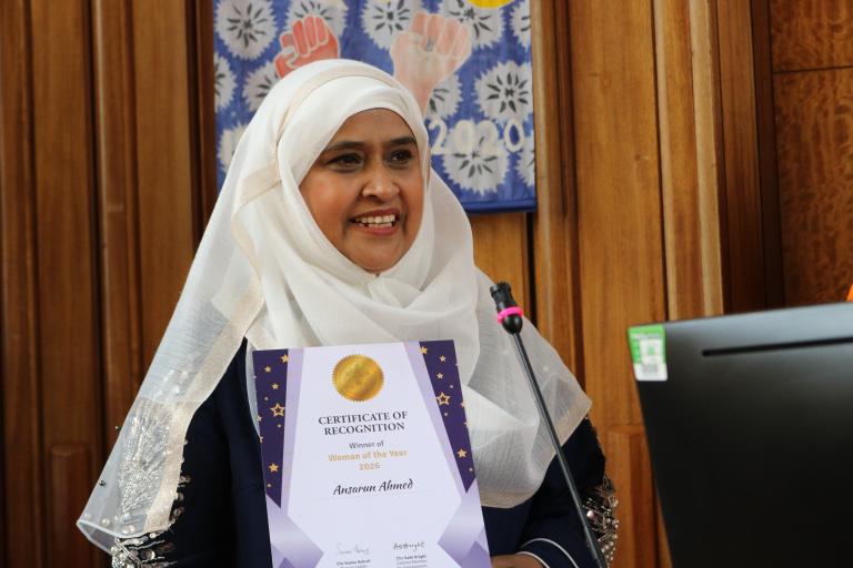 Ansarun Ahmed is showing their winning certificate