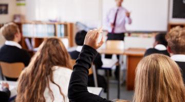 Pupils and teacher in a classroom