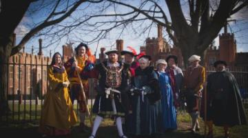 An image of King Henry VIII and other people from Tudor times