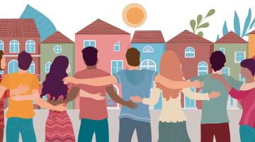 people embracing in a row in front of houses