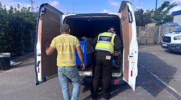 Enforcement officer inspecting vehicle