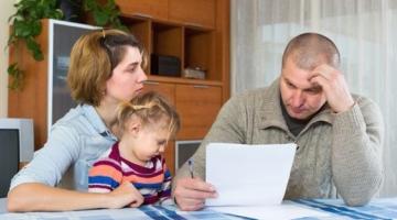 family looking at bills