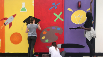 students painting