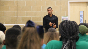 Adam Gemeli talks to students