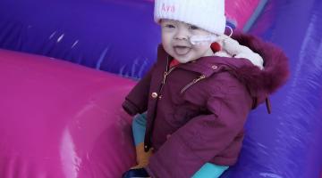 Ava on bouncy castle