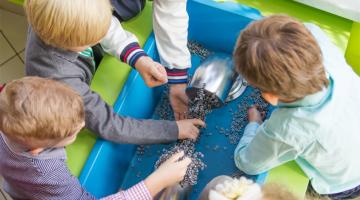 children doing a science experiment