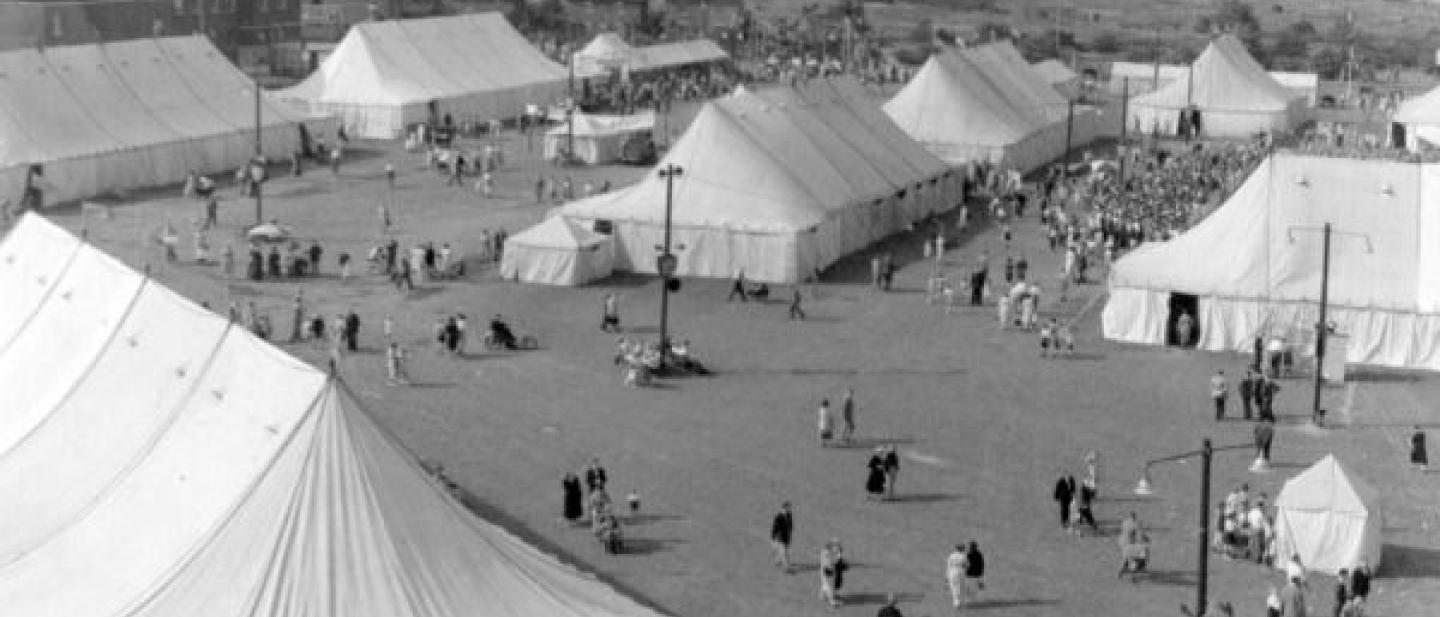 Archival photo of the Dagenham Town Show showing tents and visitors