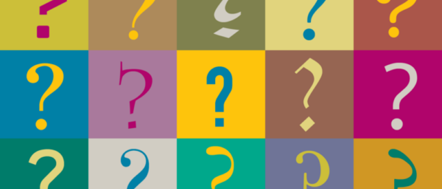 Image of 15 question marks in different fonts and colours in a grid pattern. 