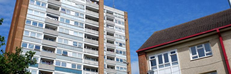 flat and house against blue sky