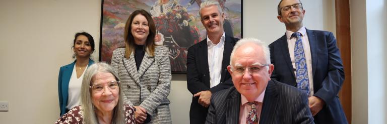 Councillors and Queen Mary colleagues signing 