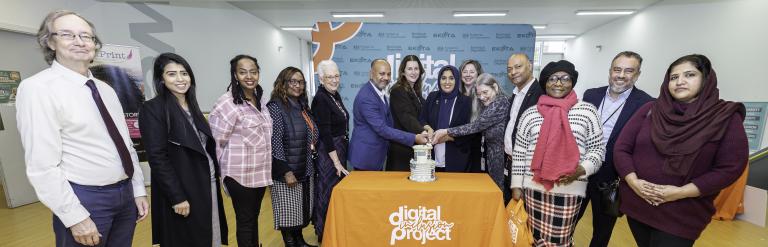 B&D cllrs, staff and Ekota colleagues cut celebratory cake 