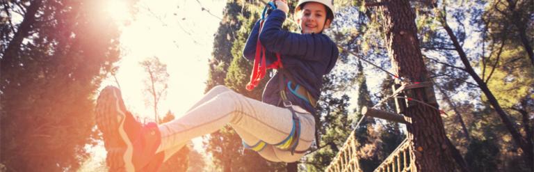 Young person on high ropes
