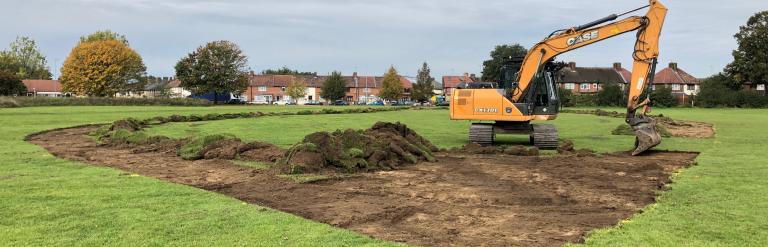 Digger digging the ground