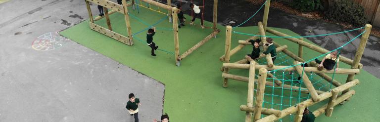children playing on climbing frame