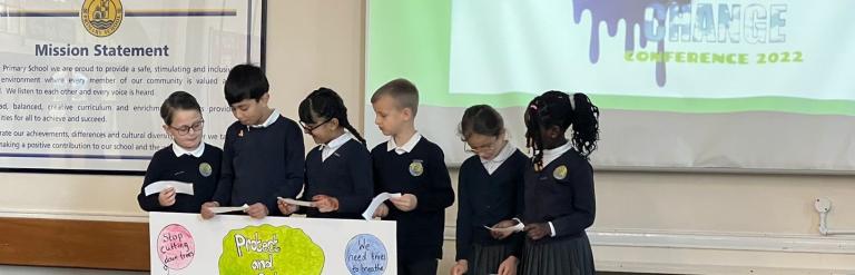 Ripple Primary pupils on stage at climate conference