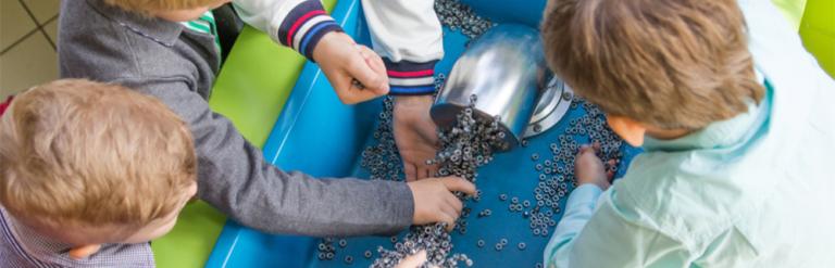 children doing a science experiment