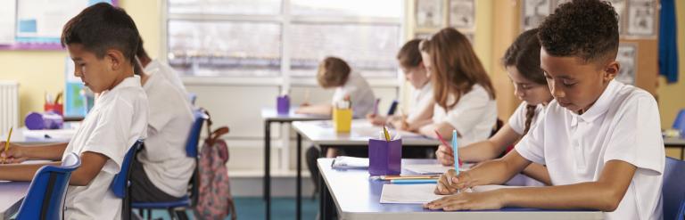 children studying in classroom 