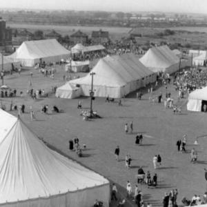 Archival photo of the Dagenham Town Show showing tents and visitors