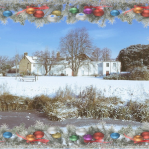 A Christmas card with a snowy landscape scene