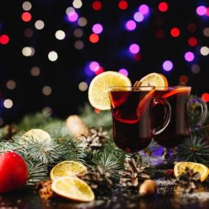A image of filled glasses and Christmas decorations