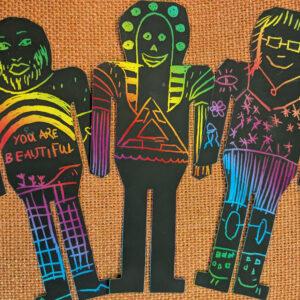 Colourful cut-out art of 3 figures
